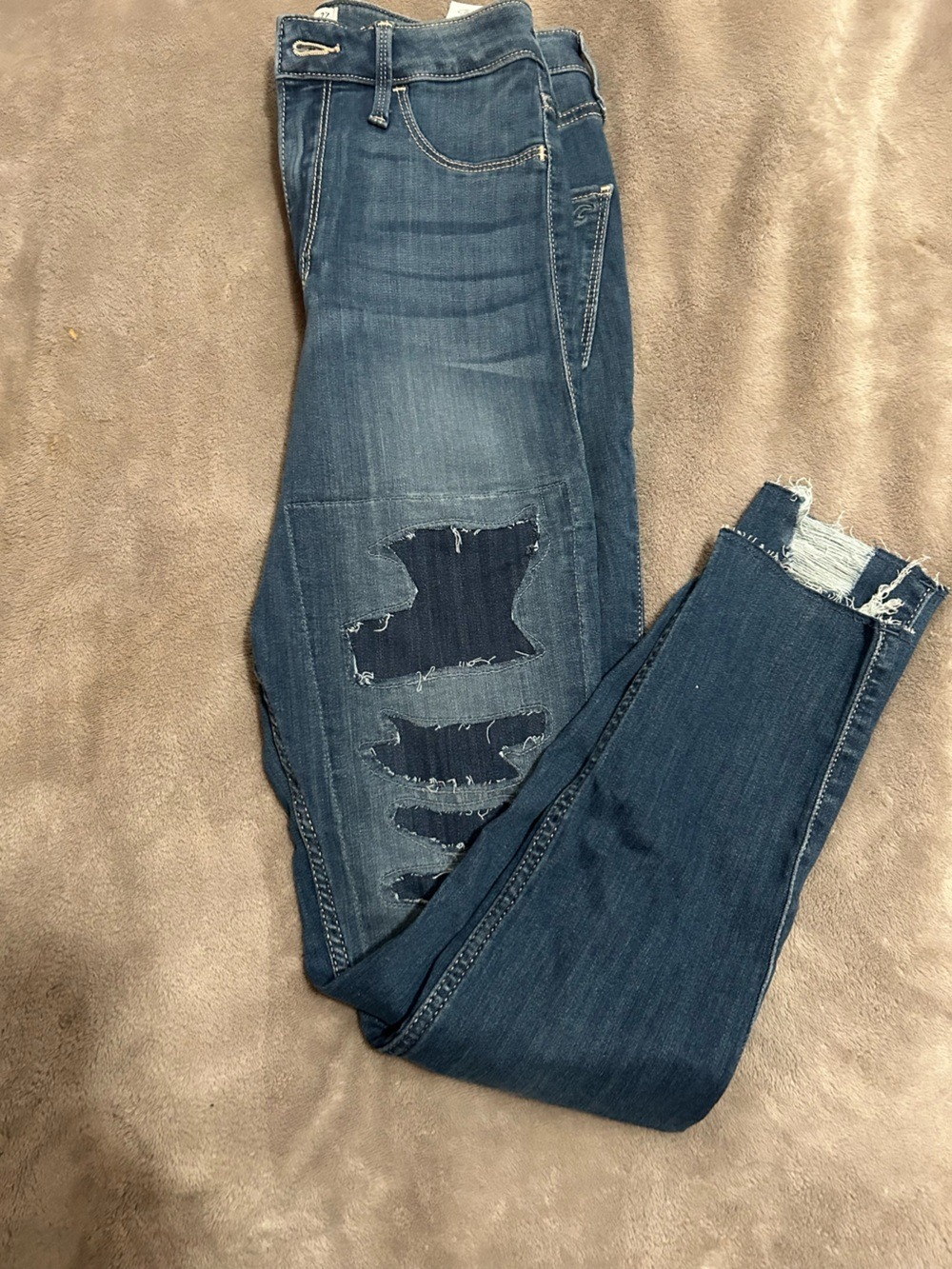 Hollister Women’s Skinny Ripped Patchwork Jeans in Dark Blue